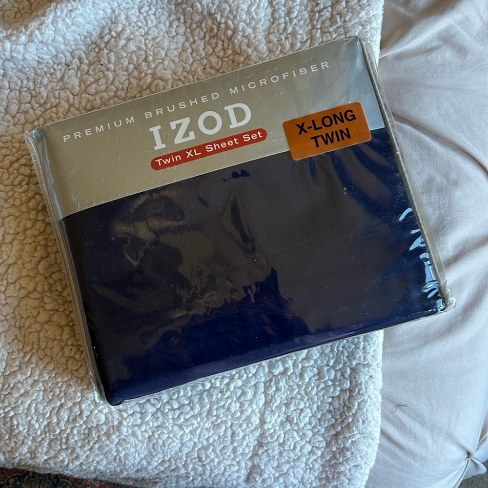 Never opened dark blue Twin XL Sheet Set